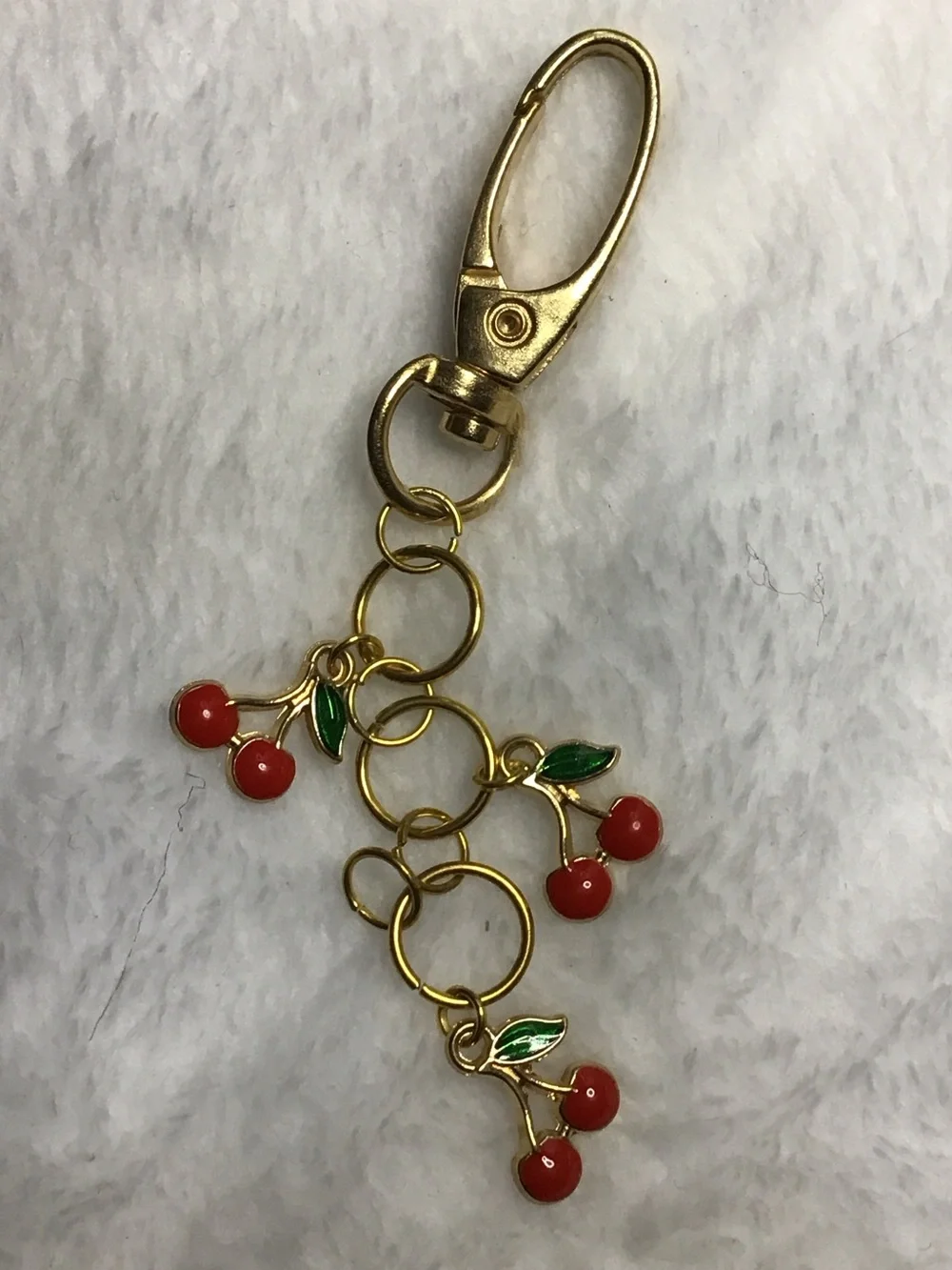 Gold-Tone Cherry Charm Keychain with Red Enamel Accents